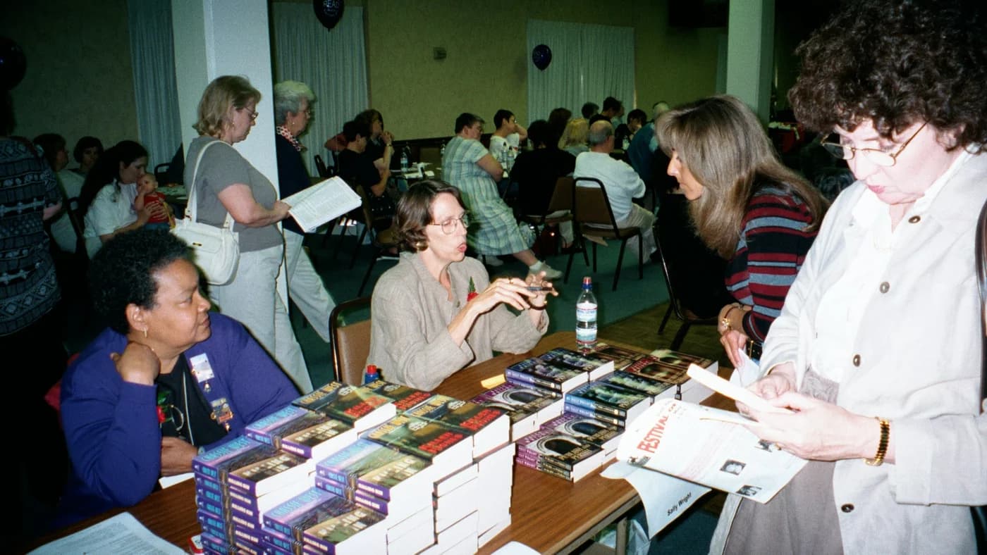 Fans meet their favorite authors. And, of course, buy their books.